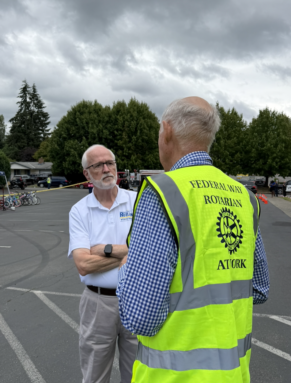 Michael Rutland with a Federal Way Rotarian volunteer