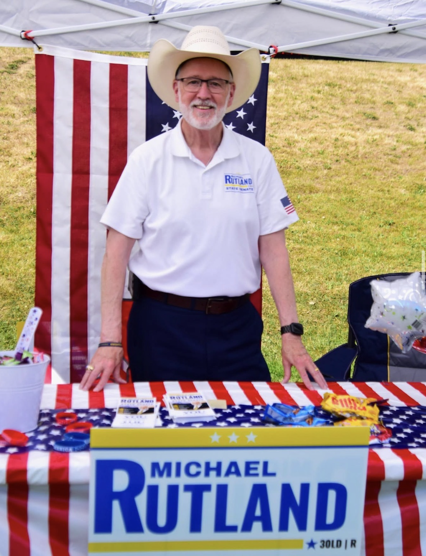 Michael Rutland at his Michael Rutland for State Senate campaign booth