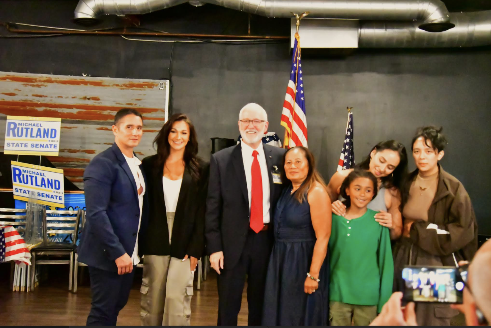 Michael Rutland with family and supporters